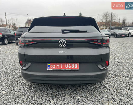 Серый Фольксваген ID.4, объемом двигателя 0 л и пробегом 128 тыс. км за 25995 $, фото 2 на Automoto.ua
