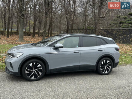 Серый Фольксваген ID.4, объемом двигателя 0 л и пробегом 104 тыс. км за 22600 $, фото 1 на Automoto.ua