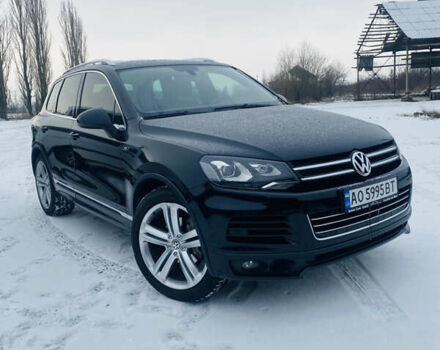 Черный Фольксваген Touareg R, объемом двигателя 3 л и пробегом 205 тыс. км за 26500 $, фото 2 на Automoto.ua