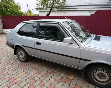 Серый Вольво 340, объемом двигателя 2 л и пробегом 240 тыс. км за 1000 $, фото 5 на Automoto.ua