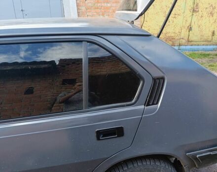 Серый Вольво 340, объемом двигателя 0 л и пробегом 230 тыс. км за 724 $, фото 1 на Automoto.ua