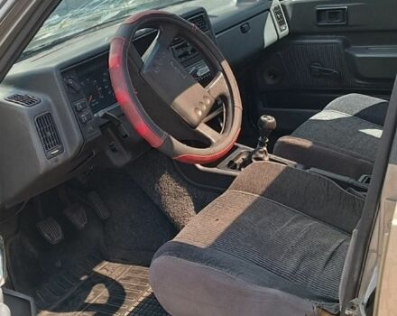 Серый Вольво 340, объемом двигателя 2 л и пробегом 200 тыс. км за 460 $, фото 1 на Automoto.ua