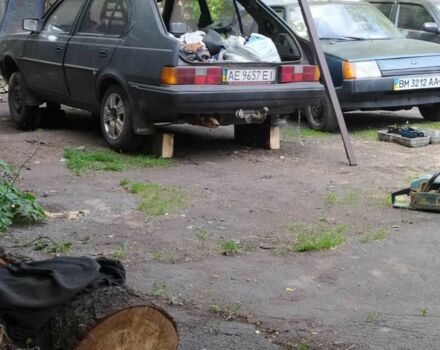Серый Вольво 340, объемом двигателя 1 л и пробегом 1 тыс. км за 448 $, фото 1 на Automoto.ua