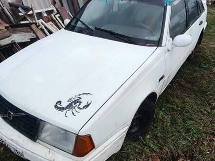 Белый Вольво 440, объемом двигателя 1.7 л и пробегом 395 тыс. км за 352 $, фото 1 на Automoto.ua