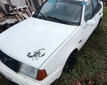 Белый Вольво 440, объемом двигателя 1.7 л и пробегом 395 тыс. км за 352 $, фото 1 на Automoto.ua