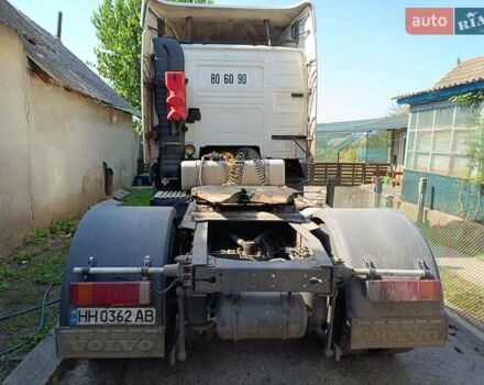 Белый Вольво FH 12, объемом двигателя 12.1 л и пробегом 100 тыс. км за 4800 $, фото 1 на Automoto.ua