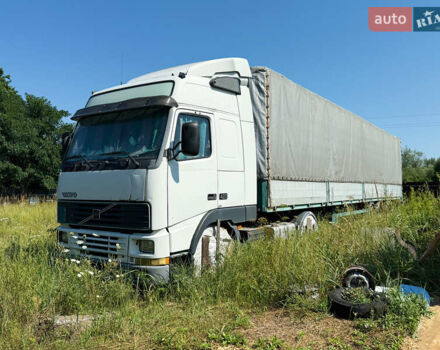 Белый Вольво FH 12, объемом двигателя 12.1 л и пробегом 993 тыс. км за 10500 $, фото 2 на Automoto.ua