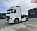 Белый Вольво FH 12, объемом двигателя 12.8 л и пробегом 900 тыс. км за 10250 $, фото 1 на Automoto.ua