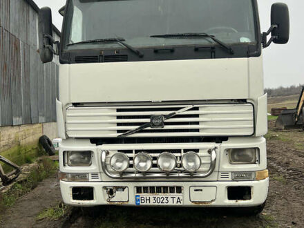 Белый Вольво FH 12, объемом двигателя 12.13 л и пробегом 600 тыс. км за 3600 $, фото 1 на Automoto.ua