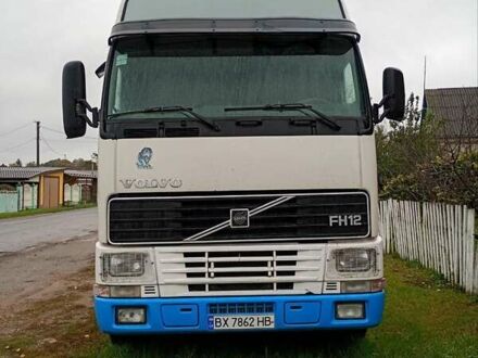 Белый Вольво FH 12, объемом двигателя 12.1 л и пробегом 1000 тыс. км за 8000 $, фото 1 на Automoto.ua