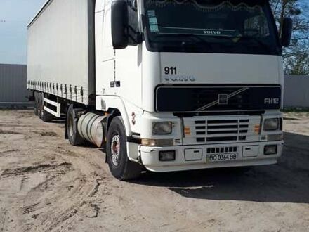 Белый Вольво FH 12, объемом двигателя 12.1 л и пробегом 702 тыс. км за 9999 $, фото 1 на Automoto.ua