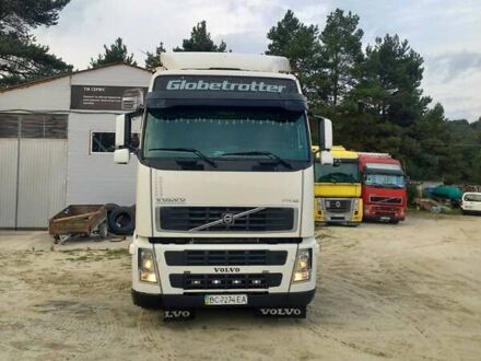 Белый Вольво FH 12, объемом двигателя 12.13 л и пробегом 830 тыс. км за 10300 $, фото 1 на Automoto.ua