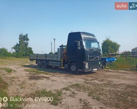 Черный Вольво FH 12, объемом двигателя 12.1 л и пробегом 258 тыс. км за 28000 $, фото 31 на Automoto.ua