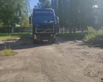 Черный Вольво FH 12, объемом двигателя 12.1 л и пробегом 258 тыс. км за 28000 $, фото 11 на Automoto.ua