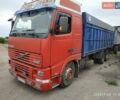 Красный Вольво FH 12, объемом двигателя 12.1 л и пробегом 220 тыс. км за 8800 $, фото 1 на Automoto.ua