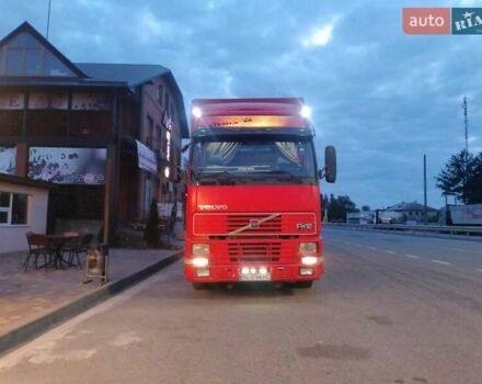Красный Вольво FH 12, объемом двигателя 12 л и пробегом 865 тыс. км за 13000 $, фото 2 на Automoto.ua