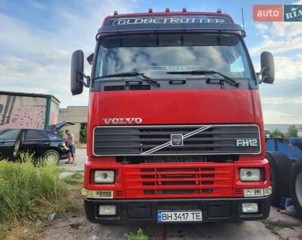 Красный Вольво FH 12, объемом двигателя 12.1 л и пробегом 700 тыс. км за 10500 $, фото 1 на Automoto.ua