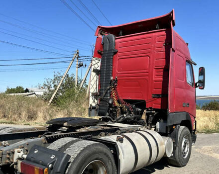 Красный Вольво FH 12, объемом двигателя 12.11 л и пробегом 1000 тыс. км за 6600 $, фото 1 на Automoto.ua