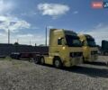 Желтый Вольво FH 12, объемом двигателя 0 л и пробегом 124 тыс. км за 9700 $, фото 1 на Automoto.ua
