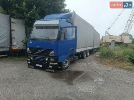 Синий Вольво FH 12, объемом двигателя 12.13 л и пробегом 230 тыс. км за 10500 $, фото 1 на Automoto.ua