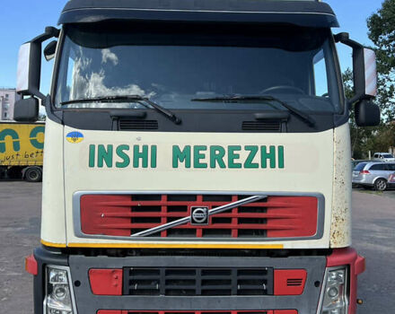 Белый Вольво FH 13, объемом двигателя 12.8 л и пробегом 776 тыс. км за 11000 $, фото 1 на Automoto.ua