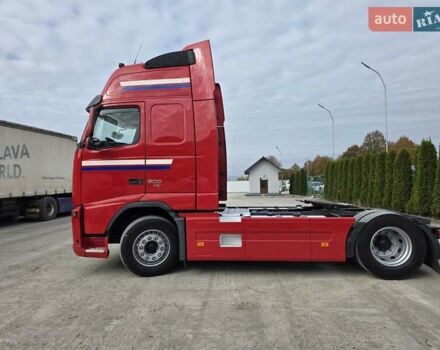 Червоний Вольво FH 13, об'ємом двигуна 12.7 л та пробігом 999 тис. км за 26247 $, фото 1 на Automoto.ua