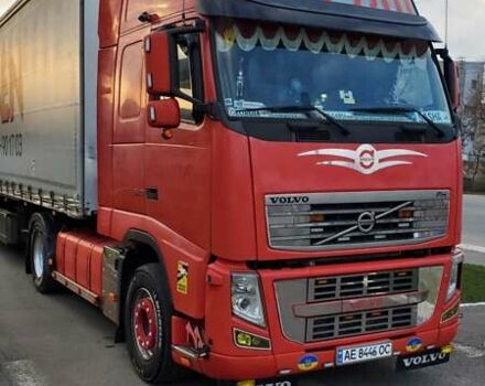 Красный Вольво FH 13, объемом двигателя 12.9 л и пробегом 825 тыс. км за 43000 $, фото 1 на Automoto.ua