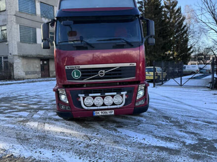 Червоний Вольво FH 13, об'ємом двигуна 12.78 л та пробігом 305 тис. км за 24000 $, фото 1 на Automoto.ua