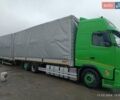 Зеленый Вольво FH 13, объемом двигателя 12.9 л и пробегом 925 тыс. км за 38400 $, фото 1 на Automoto.ua