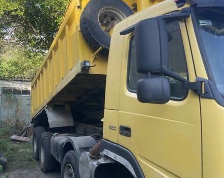 Желтый Вольво ФМ 12, объемом двигателя 12.1 л и пробегом 250 тыс. км за 52000 $, фото 1 на Automoto.ua