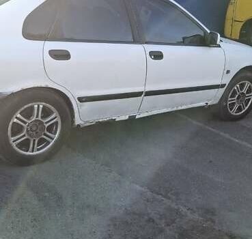 Белый Вольво С40, объемом двигателя 1.8 л и пробегом 350 тыс. км за 1600 $, фото 9 на Automoto.ua