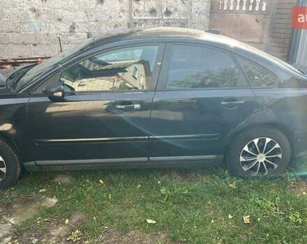 Черный Вольво С40, объемом двигателя 1.6 л и пробегом 319 тыс. км за 5300 $, фото 1 на Automoto.ua