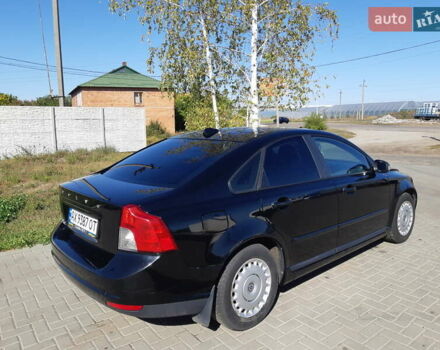 Черный Вольво С40, объемом двигателя 1.6 л и пробегом 251 тыс. км за 7000 $, фото 1 на Automoto.ua