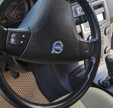 Вольво С40 2009 в Старом Самборе на Automoto.ua Черный Вольво С40, объемом двигателя 1.6 л и пробегом 255 тыс. км за 5999 $, фото 6 на Automoto.ua