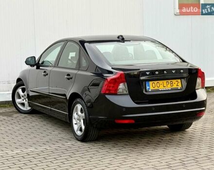 Черный Вольво С40, объемом двигателя 1.6 л и пробегом 236 тыс. км за 8750 $, фото 4 на Automoto.ua