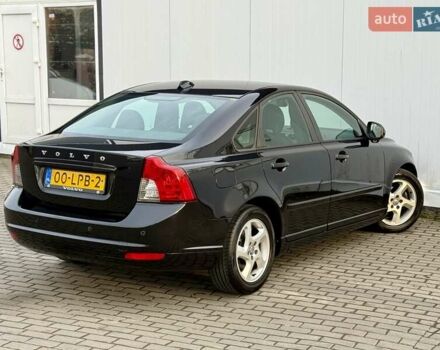 Черный Вольво С40, объемом двигателя 1.6 л и пробегом 236 тыс. км за 8750 $, фото 6 на Automoto.ua