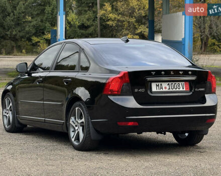 Черный Вольво С40, объемом двигателя 1.6 л и пробегом 210 тыс. км за 8800 $, фото 37 на Automoto.ua