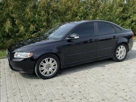 Черный Вольво С40, объемом двигателя 1.6 л и пробегом 263 тыс. км за 7200 $, фото 1 на Automoto.ua