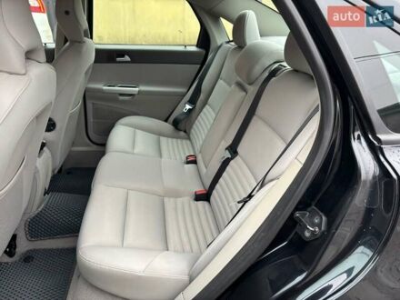 Черный Вольво С40, объемом двигателя 2 л и пробегом 230 тыс. км за 8500 $, фото 1 на Automoto.ua