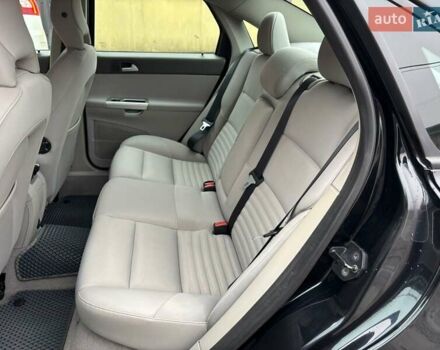 Черный Вольво С40, объемом двигателя 2 л и пробегом 230 тыс. км за 8500 $, фото 1 на Automoto.ua