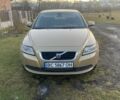 Желтый Вольво С40, объемом двигателя 1.6 л и пробегом 260 тыс. км за 5800 $, фото 1 на Automoto.ua