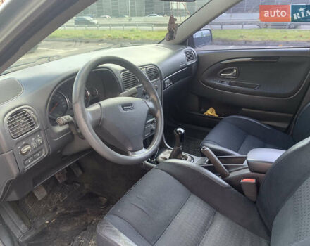 Вольво С40 2003 в Киеве на Automoto.ua Серый Вольво С40, объемом двигателя 1.8 л и пробегом 169 тыс. км за 3600 $, фото 14 на Automoto.ua