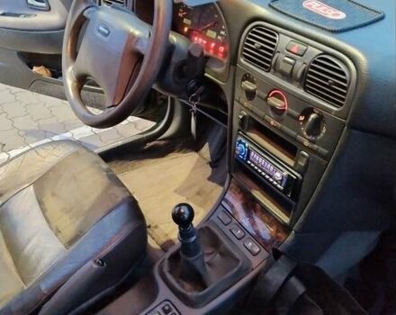 Зеленый Вольво С40, объемом двигателя 1.8 л и пробегом 249 тыс. км за 3100 $, фото 2 на Automoto.ua