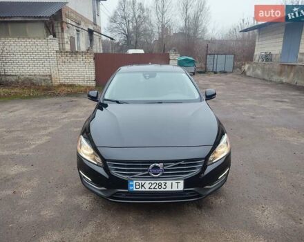 Черный Вольво С60, объемом двигателя 2.5 л и пробегом 133 тыс. км за 12100 $, фото 1 на Automoto.ua