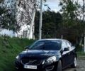 Черный Вольво С60, объемом двигателя 2.5 л и пробегом 245 тыс. км за 10700 $, фото 1 на Automoto.ua