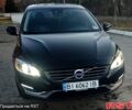 Черный Вольво С60, объемом двигателя 2.5 л и пробегом 100 тыс. км за 14800 $, фото 1 на Automoto.ua