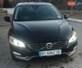 Черный Вольво С60, объемом двигателя 2.5 л и пробегом 100 тыс. км за 13800 $, фото 1 на Automoto.ua