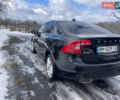 Черный Вольво С60, объемом двигателя 1.97 л и пробегом 250 тыс. км за 10400 $, фото 1 на Automoto.ua