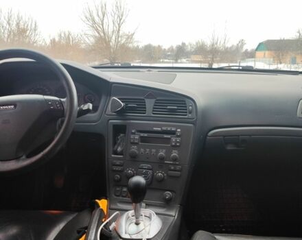 Черный Вольво С60, объемом двигателя 2.4 л и пробегом 520 тыс. км за 4000 $, фото 1 на Automoto.ua