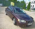 Красный Вольво С60, объемом двигателя 2.4 л и пробегом 320 тыс. км за 5200 $, фото 1 на Automoto.ua